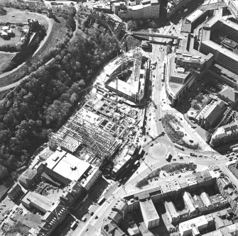 Oblique aerial view centred on the construction of the Omni Plaza with the observatory adjacent, taken from the N.