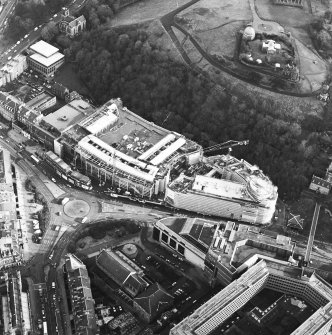 Oblique aerial view centred on the redevelopment of Greenside Place with the observatory and cathedral adjacent, taken from the W.