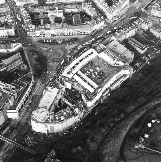 Oblique aerial view centred on the redevelopment of Greenside Place with the observatory and cathedral adjacent, taken from the SE.