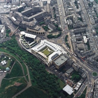 General oblique aerial view centred on the Omni Plaza with Calton Hill adjacent, taken from the NE.