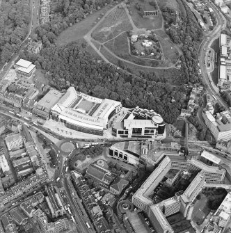 General oblique aerial view centred on the Omni Plaza with Calton Hill adjacent, taken from the W.