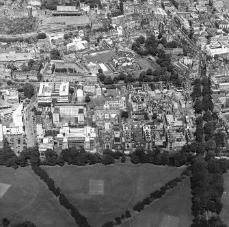 Oblique aerial view centred on the hospital with the chapel, hospital and school adjacent, taken from the S.