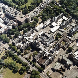 Oblique aerial view centred on the hospital, taken from the NNW.