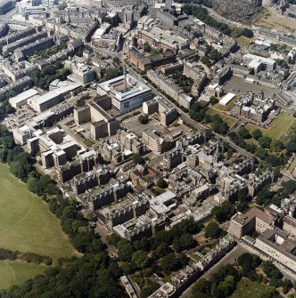 Oblique aerial view centred on the hospital with the chapel, hospital and school adjacent, taken from the ESE.