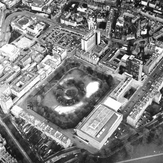 Oblique aerial view centred on the library with George Square and University buildings adjacent, taken from the SW.