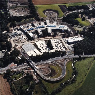 Oblique aerial view centred on the Royal Bank of Scotland headquarters under construction, taken from the N.