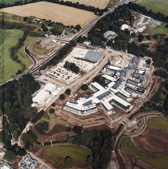 Oblique aerial view centred on the Royal Bank of Scotland headquarters under construction, taken from the SW.