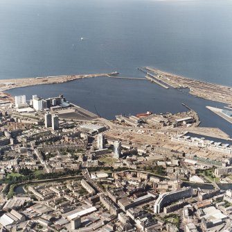 Edinburgh, oblique aerial view, taken from the S, showing Leith Docks in the top half of the photograph, and North Leith in the bottom half.