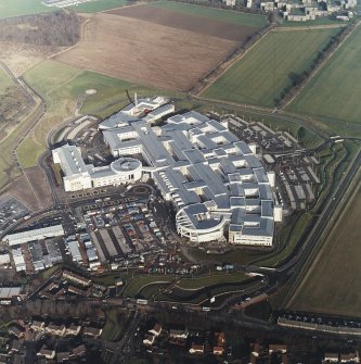 Oblique aerial view centred on the hospital, taken from the SSW.