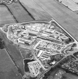 Oblique aerial view centred on the hospital under construction, taken from the W.