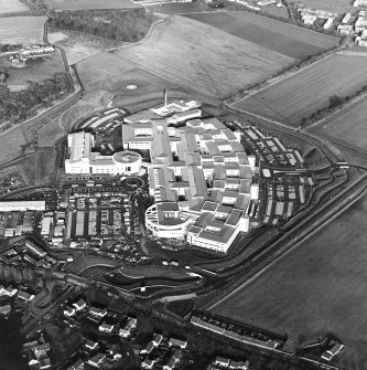 Oblique aerial view centred on the hospital, taken from the S.