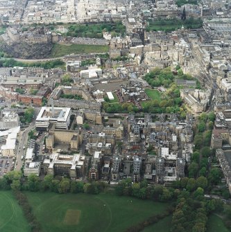Oblique aerial view centred on the hospital with the chapel, hospital and school adjacent, taken from the SSE.