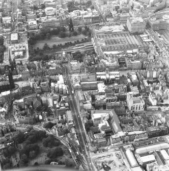 Aerial view of centre of Edinburgh including Princes Street at top of photograph, North Bridge to right, Royal Museum of Scotland and Candlemaker Row at bottom and Tolbooth Church and The Mound to left