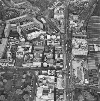 Oblique aerial view of Edinburgh centred on the east end of Princes Street, taken from the WSW.
