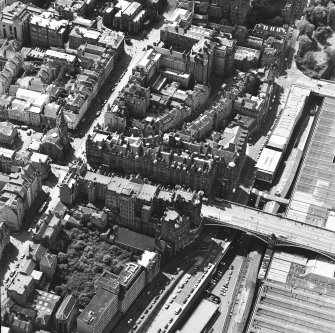 Oblique aerial view centred on the Scotsman buildings, taken from the E.