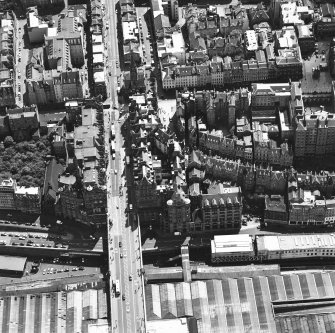 Oblique aerial view centred on the Scotsman buildings, taken from the N.