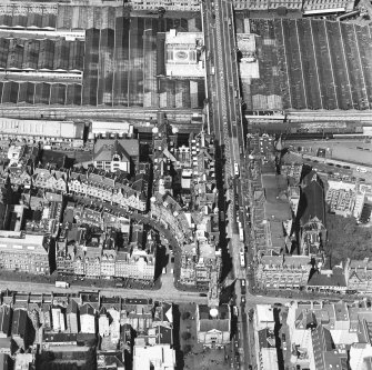 Oblique aerial view centred on the Scotsman buildings, taken from the S.