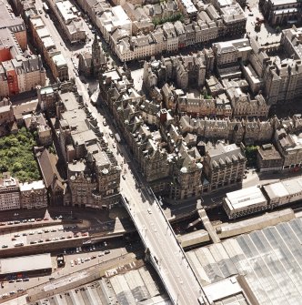 Oblique aerial view centred on the Scotsman buildings, taken from the NNE.