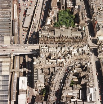 Oblique aerial view centred on the Scotsman buildings, taken from the W.