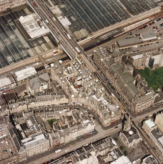 Oblique aerial view centred on the Scotsman buildings, taken from the SW.