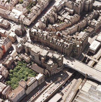 Oblique aerial view centred on the Scotsman buildings, taken from the NE.