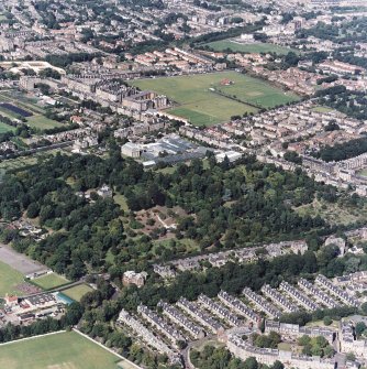 Edinburgh, oblique aerial view, taken from the S, centred on the Royal Botanic Gardens and Inverleith House, with the Stockbridge Colonies in the bottom right-hand corner.