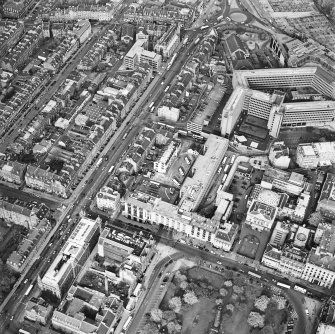 Oblique aerial view of Edinburgh centred on the St Andrew's Square Bus Station before demolition, taken from the SW.