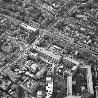 Oblique aerial view of Edinburgh centred on the St Andrew's Square Bus Station before demolition, taken from the SE.