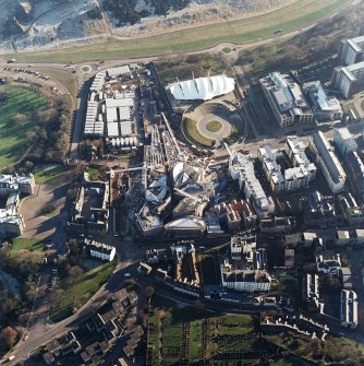 Oblique aerial view centred on the construction of the Scottish parliament, taken from the N.