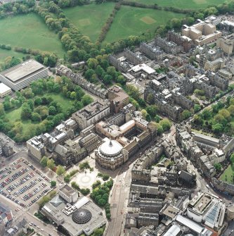 Oblique aerial view of the university centred on the hall with the hospital adjacent, taken from the NNE.