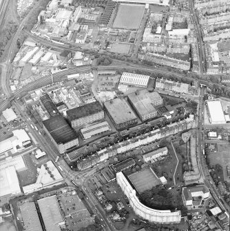 Oblique aerial view centred on the bonded warehouse with the whisky distillery and the pumphouse and pavilion adjacent, taken from the WSW.