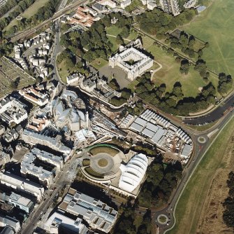 Oblique aerial view centred on the construction of the parliament, taken from the SW.