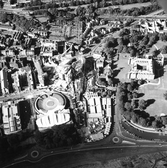 Oblique aerial view centred on the construction of the Scottish Parliament with the exhibition centre and palace adjacent, taken from the SSE.