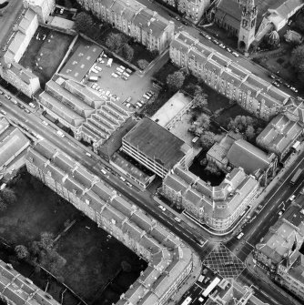 Aerial view showing the building prior to renovation to house RCAHMS seen from the North West.