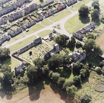 Dalmeny village and Dalmeny Parish Church, oblique aerial view.