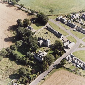 Dalmeny village and Dalmeny Parish Church, oblique aerial view.