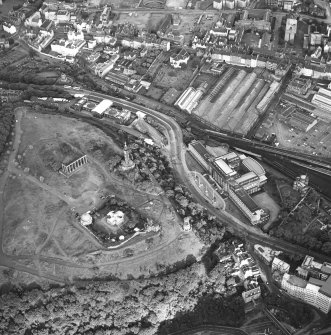 Edinburgh, oblique aerial view taken from the NW, centred on Calton Hill showing the city observatory, the National and Nelson's Monument.  St Andrew's House is also visible.