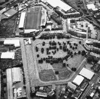 Oblique aerial view showing Easter Road, Eastern Cemetery and Albion Road, Easter Road Stadium