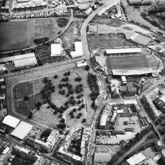 Oblique aerial view of Easter Road, Eastern Cemetery and Albion Road, Easter Road Stadium