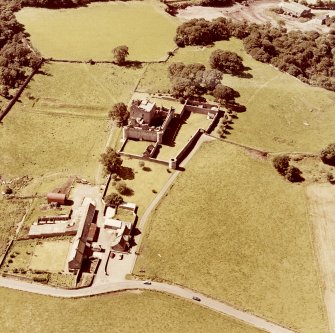 Oblique aerial view from East North East of Craigmillar Castle and Mains
