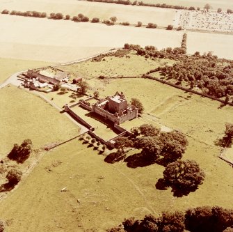 Oblique aerial view from North West of Craigmillar Castle and Mains