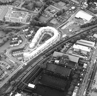 Oblique aerial view centred on Slateford Green with brewery adjacent, taken from the ESE.