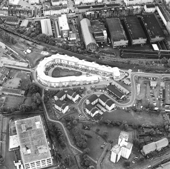 Oblique aerial view centred on Slateford Green with brewery adjacent, taken from the WSW.