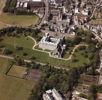 Aerial view showing Holyrood Palace and Abbey within their grounds, plus part of Canongate and Holyrood Road
