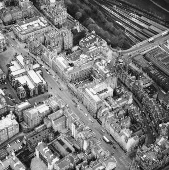 Aerial view showing High Street between North Bridge and Lawnmarket, with St Giles' Cathedral on left and City Chambers on right.