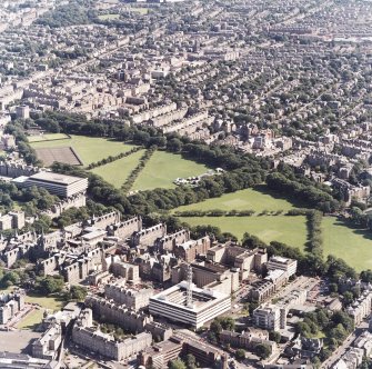 Edinburgh, oblique aerial view, taken from the NNW, centred on the Meadows, with the Royal Infirmary, and tenements on Keir Street in the bottom half of the photograph.