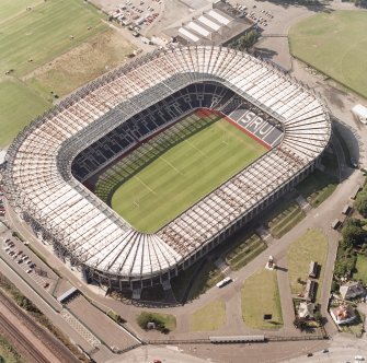 Edinburgh, Murrayfield Stadium, oblique aerial view, taken from the ESE, centred on Murrayfield Stadium. Murrayfield Ice Rink is visible in the top centre half of the photograph.