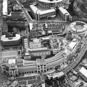 Oblique aerial view centred on the hotel, offices and conference centre with Scottish Widows offices adjacent, taken from the NNW.