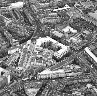 Oblique aerial view centred on Princes Exchange with hall adjacent, taken from the NNE.