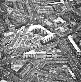 Oblique aerial view centred on Princes Exchange with hall adjacent, taken from the N.